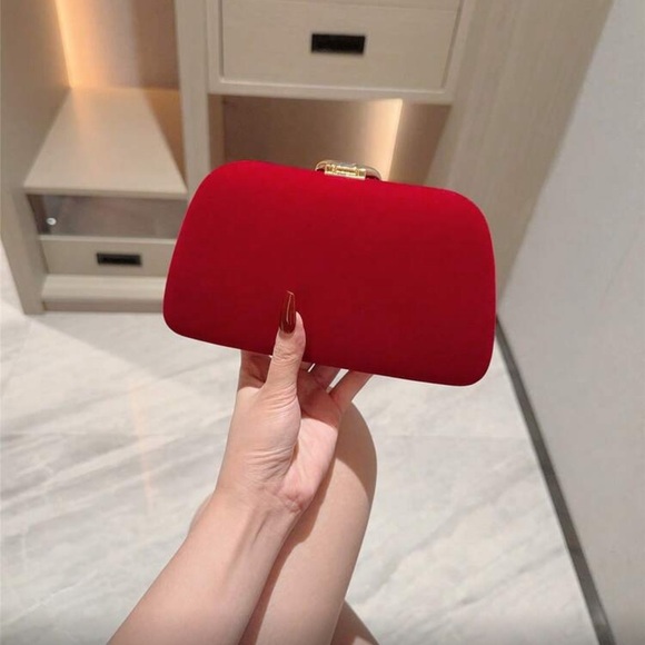 Elegant Red Clutch with Gold Snake Design  Accent